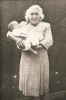 1949 Martha Rose holding one of her grandchildren