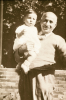 1950 Morris Rose holding one of his grandchildren